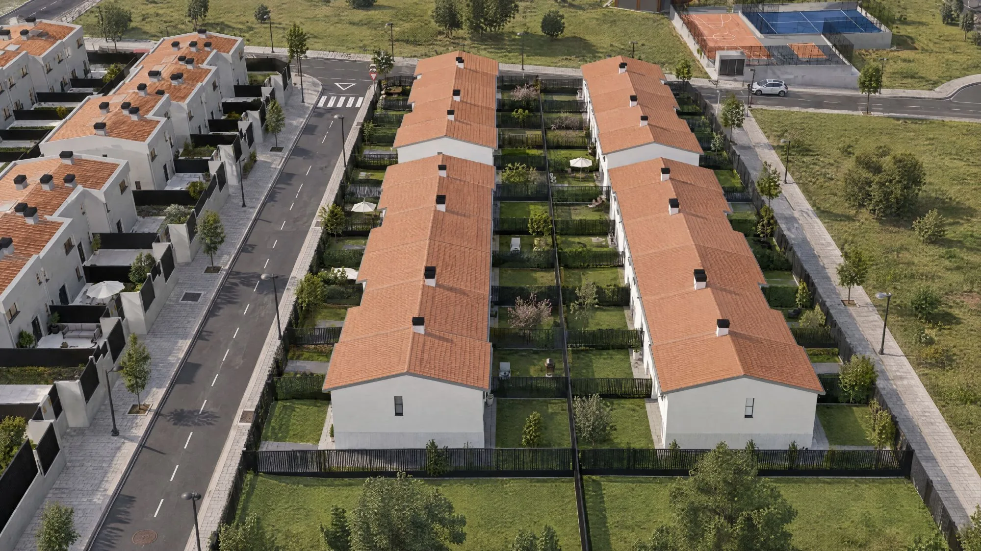 Vista aérea del conjunto: las dos hileras de casas con sus jardines privados